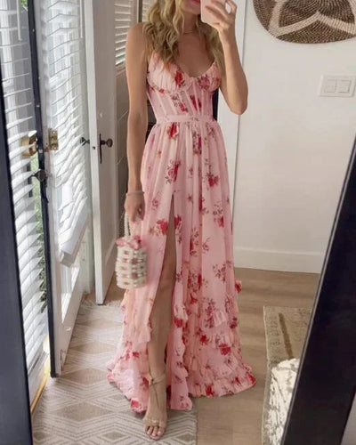 Lange damesjurk met bloemenprint en fijne bandjes voor een elegante zomerstijl