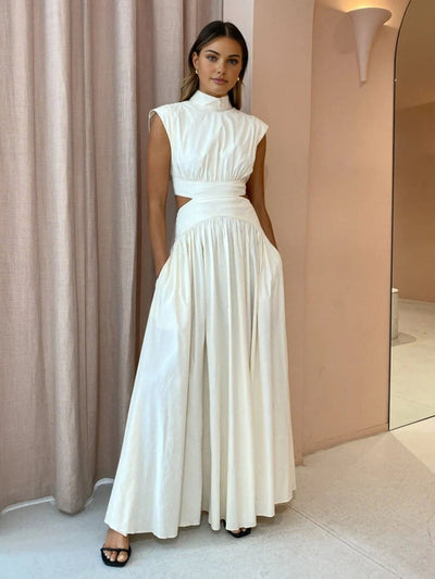 Elegante stijlvolle maxi-jurk met korte mouwen en speelse uitsparingen