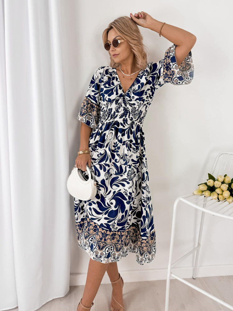 Trendy midi jurk met korte mouwen en V-hals in speelse stij