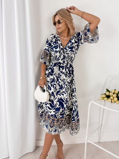 Trendy midi jurk met korte mouwen en V-hals in speelse stij
