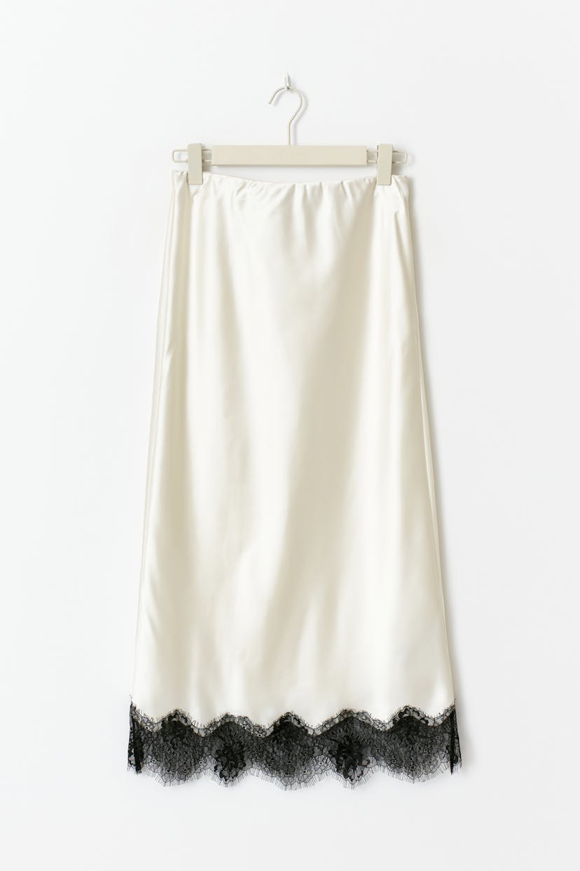 Elegante stijlvolle midi rok met verfijnde zoom