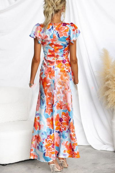 Lange jurk met bloemenprint en korte mouwen perfect voor feestdagen en stijlvolle momenten