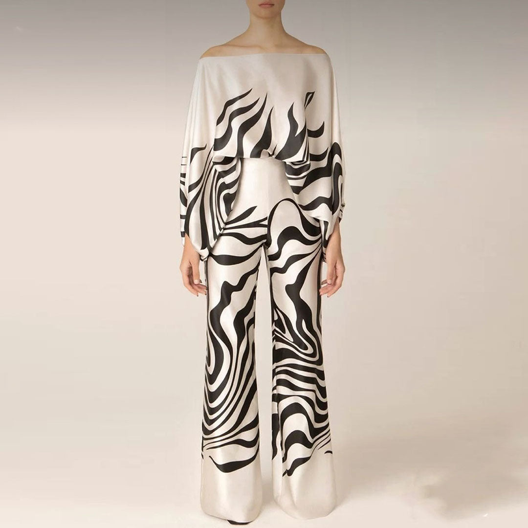 Stijlvolle dames jumpsuit met één mouw en wijde pasvorm voor een elegante uitstraling