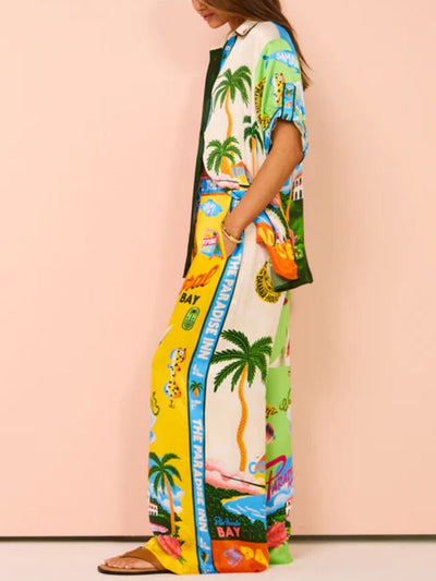 Tweedelige zomerset met wijde blouse en broek met strandprint