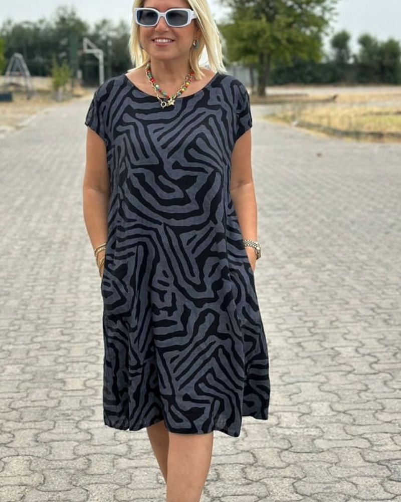 Zomerse jurk met ronde hals en sierlijke print
