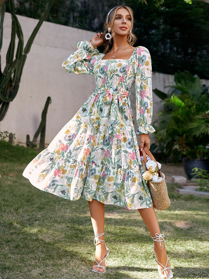 Lange damesjurk met vierkante hals bloemenprint en boho stijl met wijde mouwen