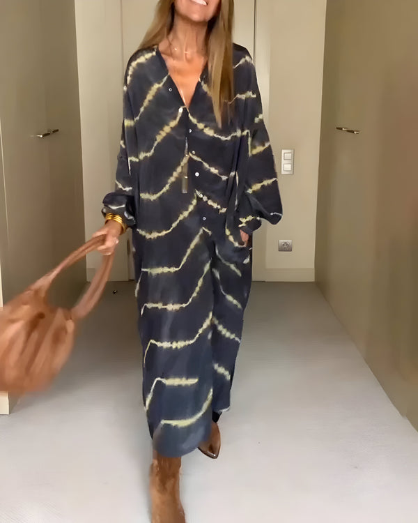 Lange boho jurk met knopen en elegante uitstraling