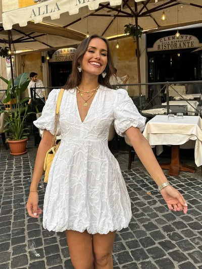 Romantische mini jurk met korte pofmouwtjes en speelse look