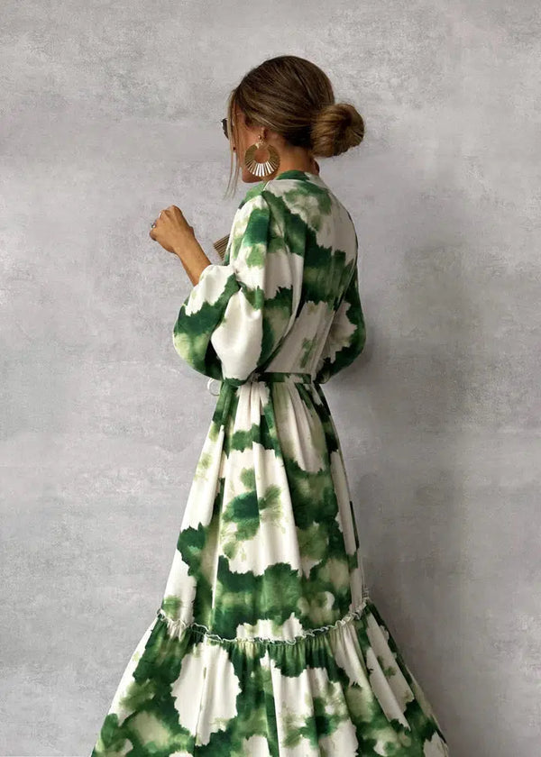 Lange damesjurk met lange mouwen V-hals en elegante vloeiende stijl