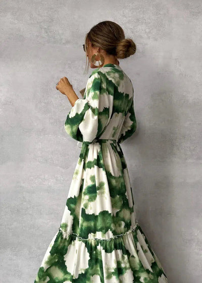 Lange damesjurk met lange mouwen V-hals en elegante vloeiende stijl