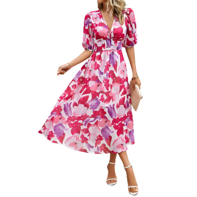 Zomerse midi jurk met korte pofmouwen en elegante uitstraling