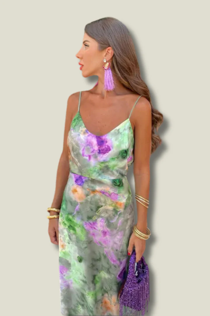 Elegante maxi jurk met smalle bandjes en open rug voor zomerse gelegenheden