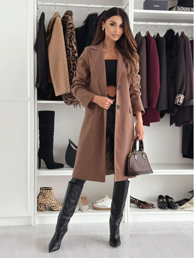 Lange elegante damesjas met knoopsluiting