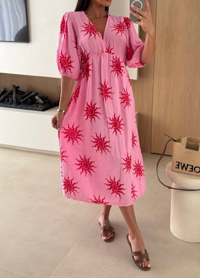Luchtige zomer maxi jurk met korte mouwen en speelse print