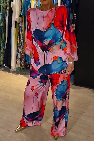 Elegante dames set met wijde blouse en bijpassende broek voor een stijlvolle uitstraling