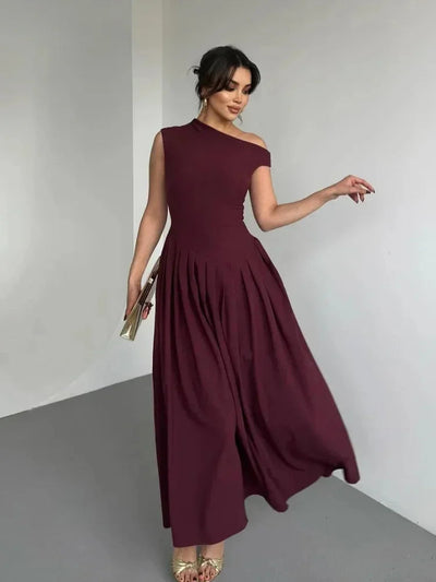 Trendy lange damesjurk met open schouderlijn en elegante pasvorm