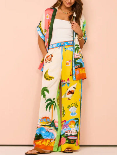 Tweedelige zomerset met wijde blouse en broek met strandprint