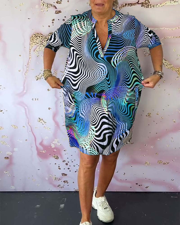 Clara - Levendige kleurrijke jurk met print