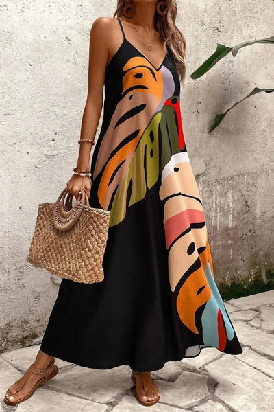 Zomerse maxi jurk met bladerenmotief en V-hals