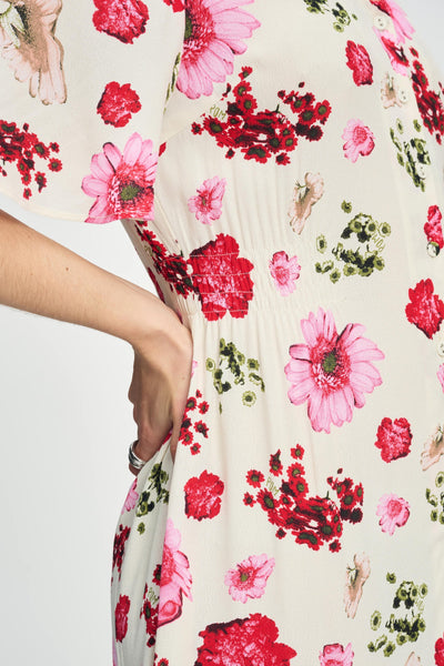Elegante midi damesjurk met bloemenprint knopen en korte mouwen