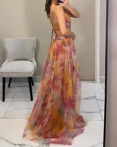 Romantische maxi jurk met dunne bandjes en zachte aquarelprint