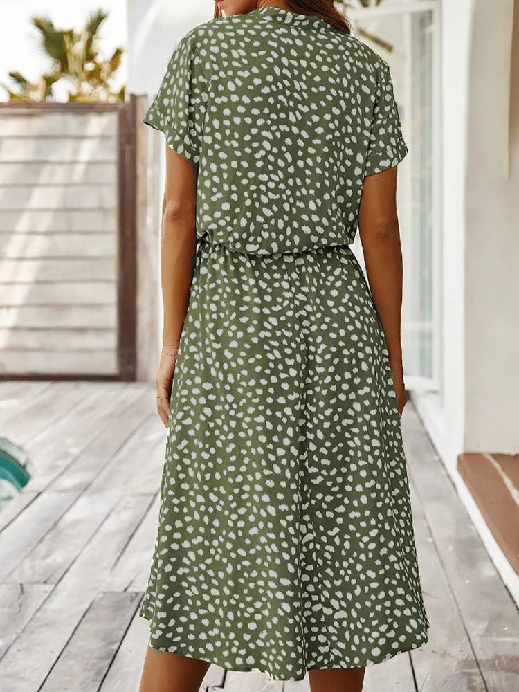 Stijlvolle dames midi jurk met korte mouwen voor zomerse dagen