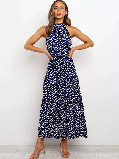 Stijlvolle zomer maxi jurk met stippenprint en halterstijl