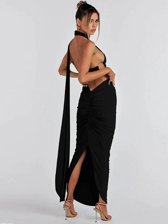 Luxe set met haltertop en asymmetrische maxi rok voor een elegante uitstraling