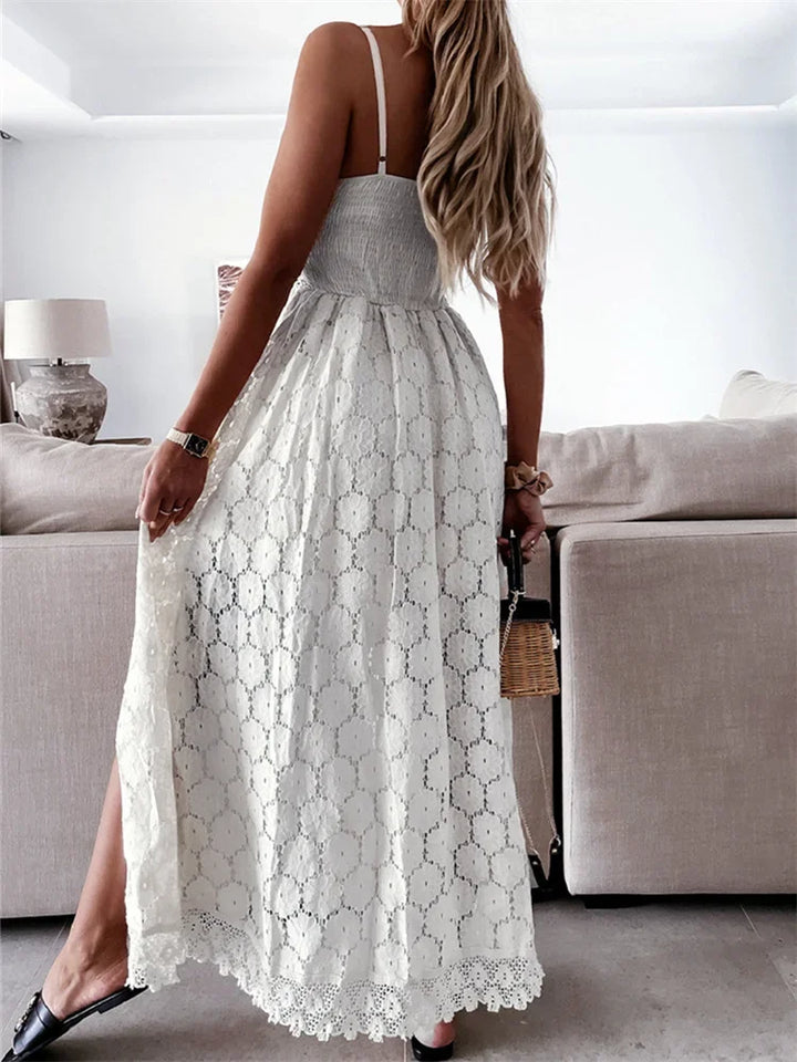 Korte zomer jumpsuit met fijne bandjes en vloeiende sleep