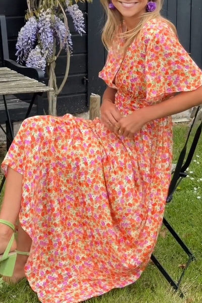 Elegante maxi jurk met V-hals en sierlijke vleugelmouwen