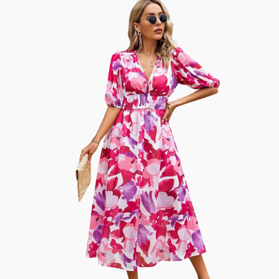 Elegante midi jurk met bloemenmotief en pofmouwen