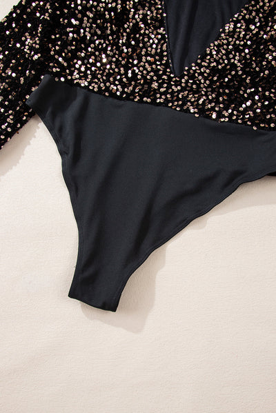 Elegante body met diepe V-hals, glinsterende accenten en pofmouwen