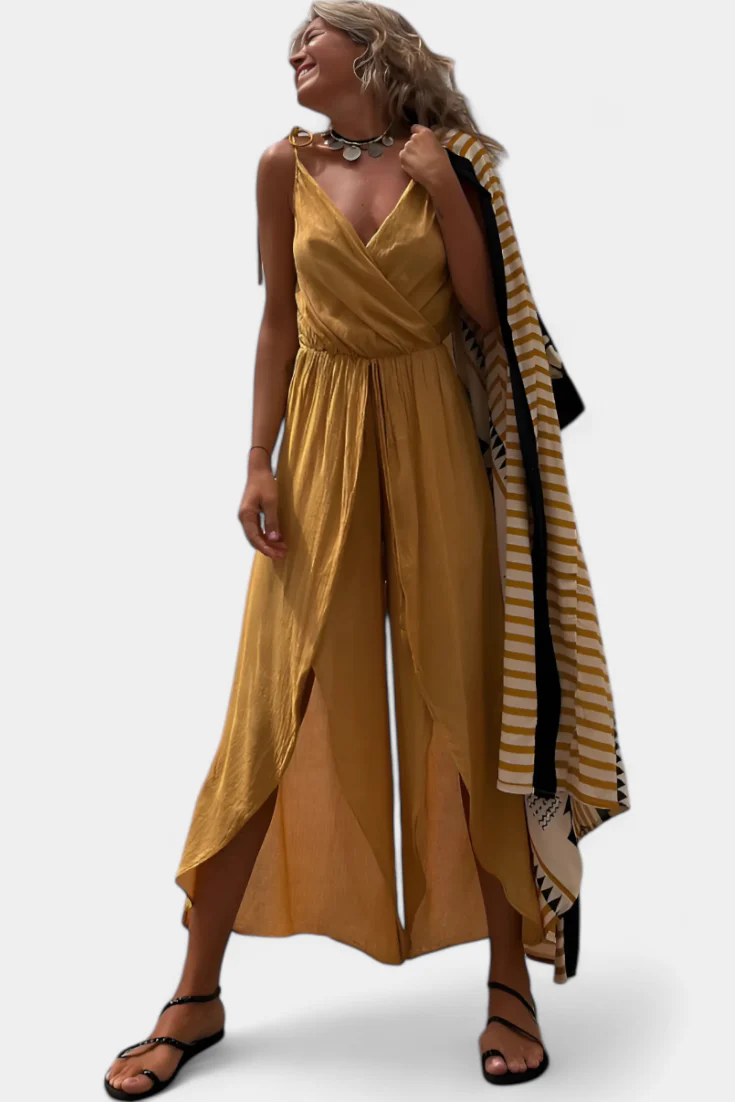 Lange luchtige jumpsuit met smalle bandjes diepe halslijn en open pijpen