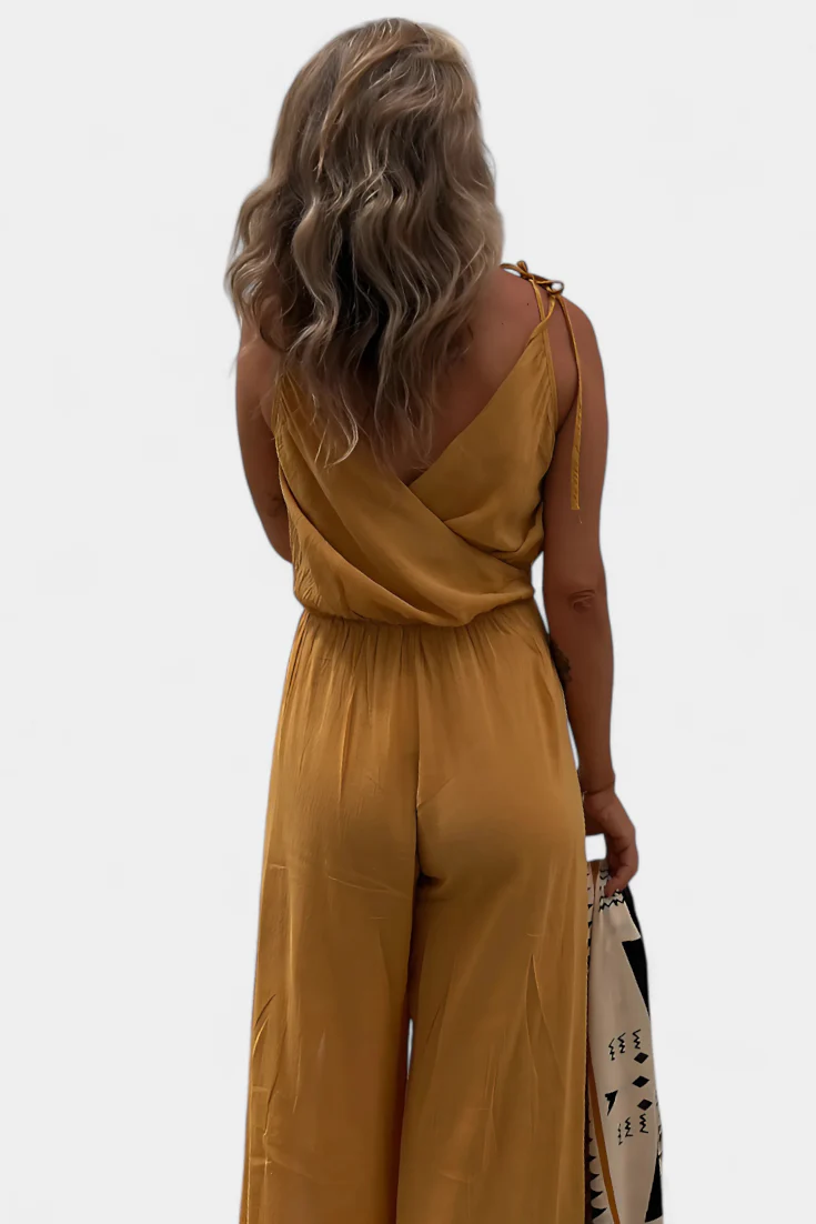Lange luchtige jumpsuit met smalle bandjes diepe halslijn en open pijpen