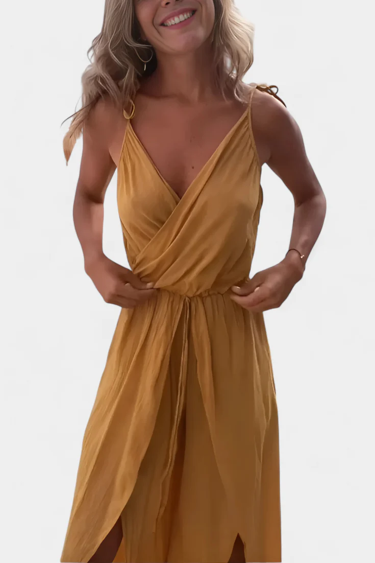 Lange luchtige jumpsuit met smalle bandjes diepe halslijn en open pijpen