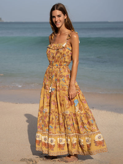 Lange strandjurk met bandjes en luchtige elegante uitstraling