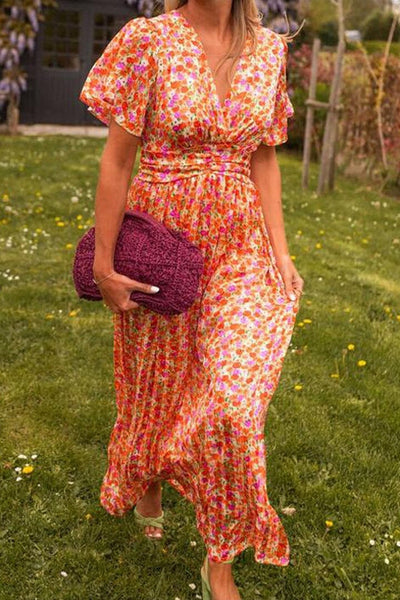 Elegante maxi jurk met V-hals en sierlijke vleugelmouwen