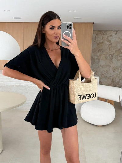 Korte dames jumpsuit met wijde korte mouwen en elegante uitstraling