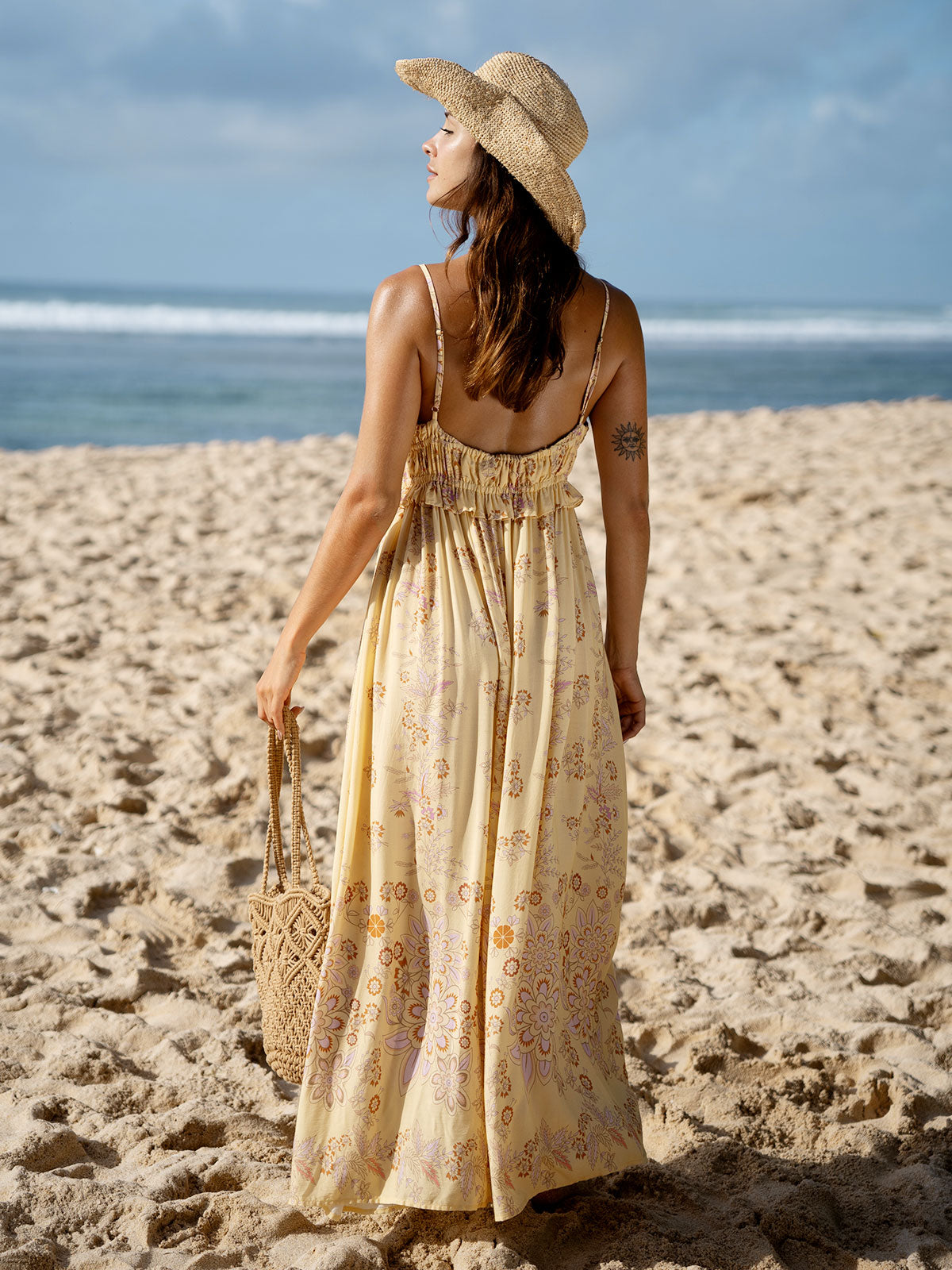 Mouwloze strandjurk met strikdetail in maxi lengte