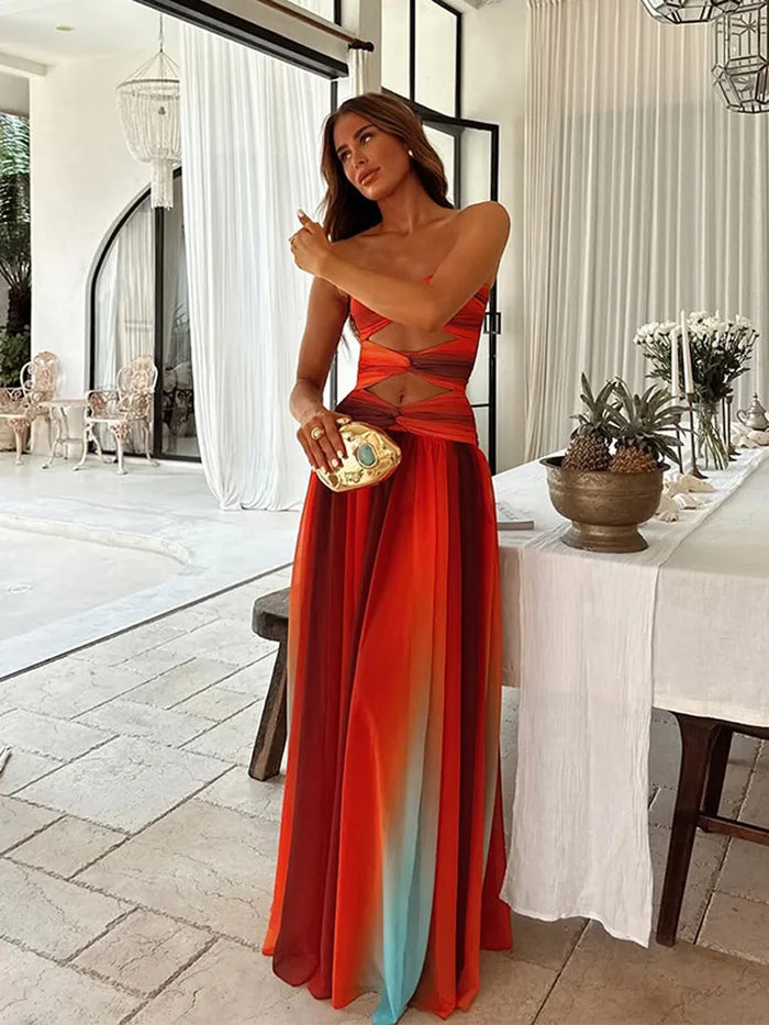 Elegante mouwloze maxi jurk met verloop en uitgesneden details