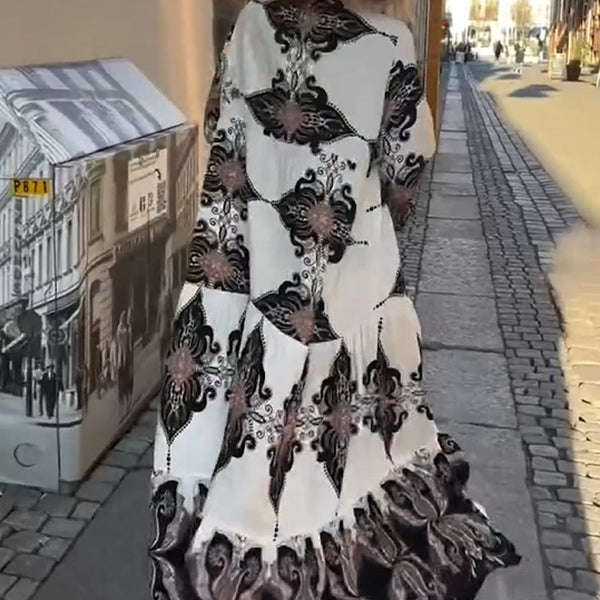 Elegante damesjurk met print en losvallend ontwerp voor een luchtige en stijlvolle look