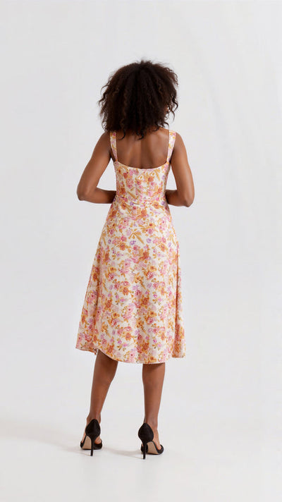 Middellange damesjurk met bloemenprint en fijne bandjes
