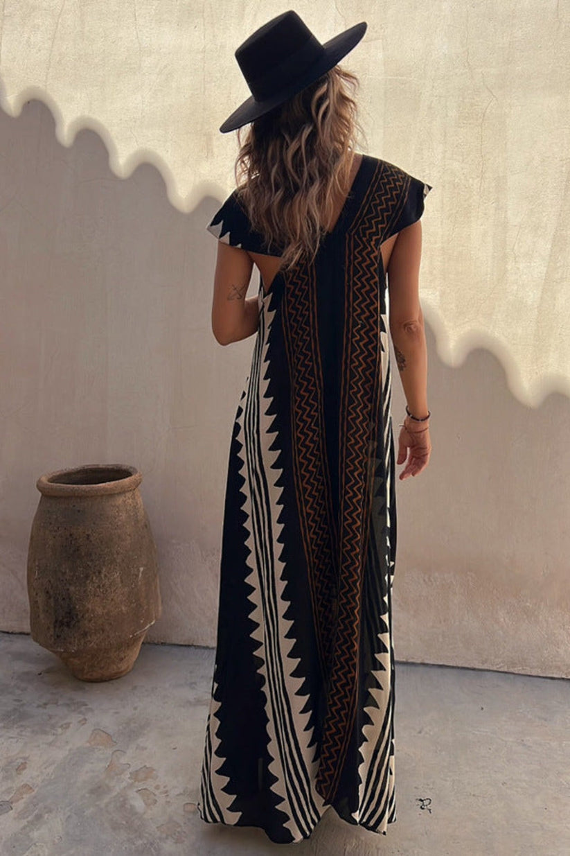 Zomerse maxi jurk met korte mouwen en opvallend patroon voor een elegante uitstraling