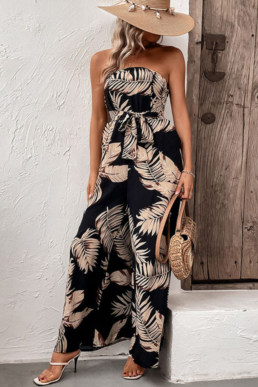 Straploze dames jumpsuit met bladprint en wijde pijpen voor een zomerse look