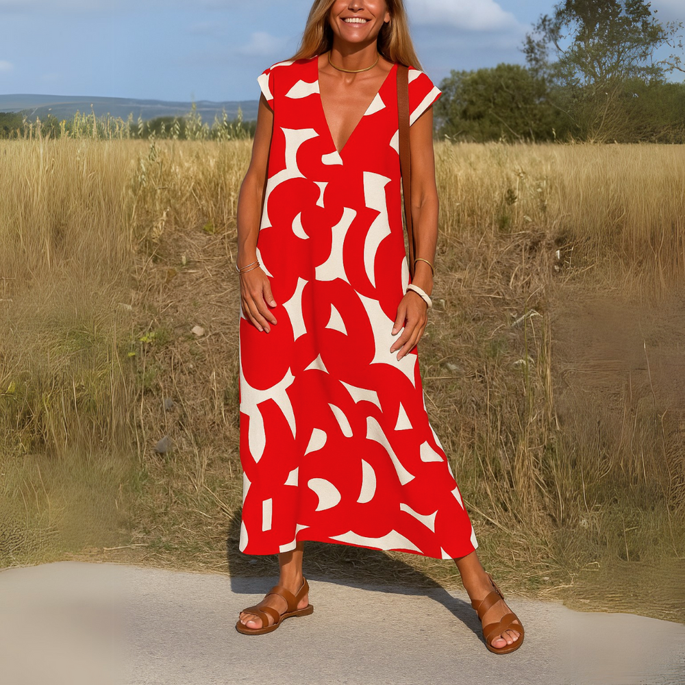 Elegante maxi jurk met korte mouwen en geometrisch patroon
