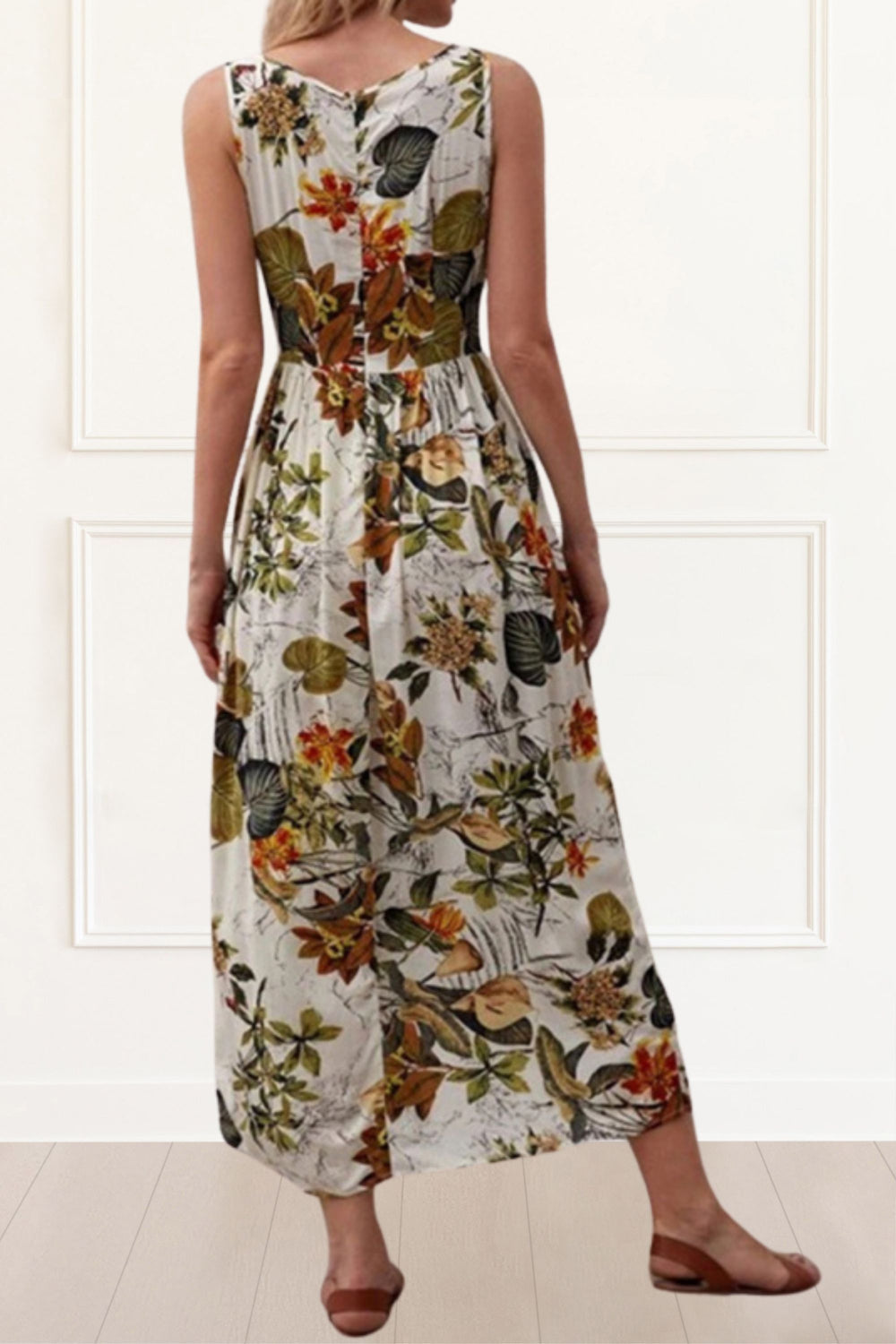 Lange damesjurk met bloemenprint ronde hals en mouwloos ontwerp