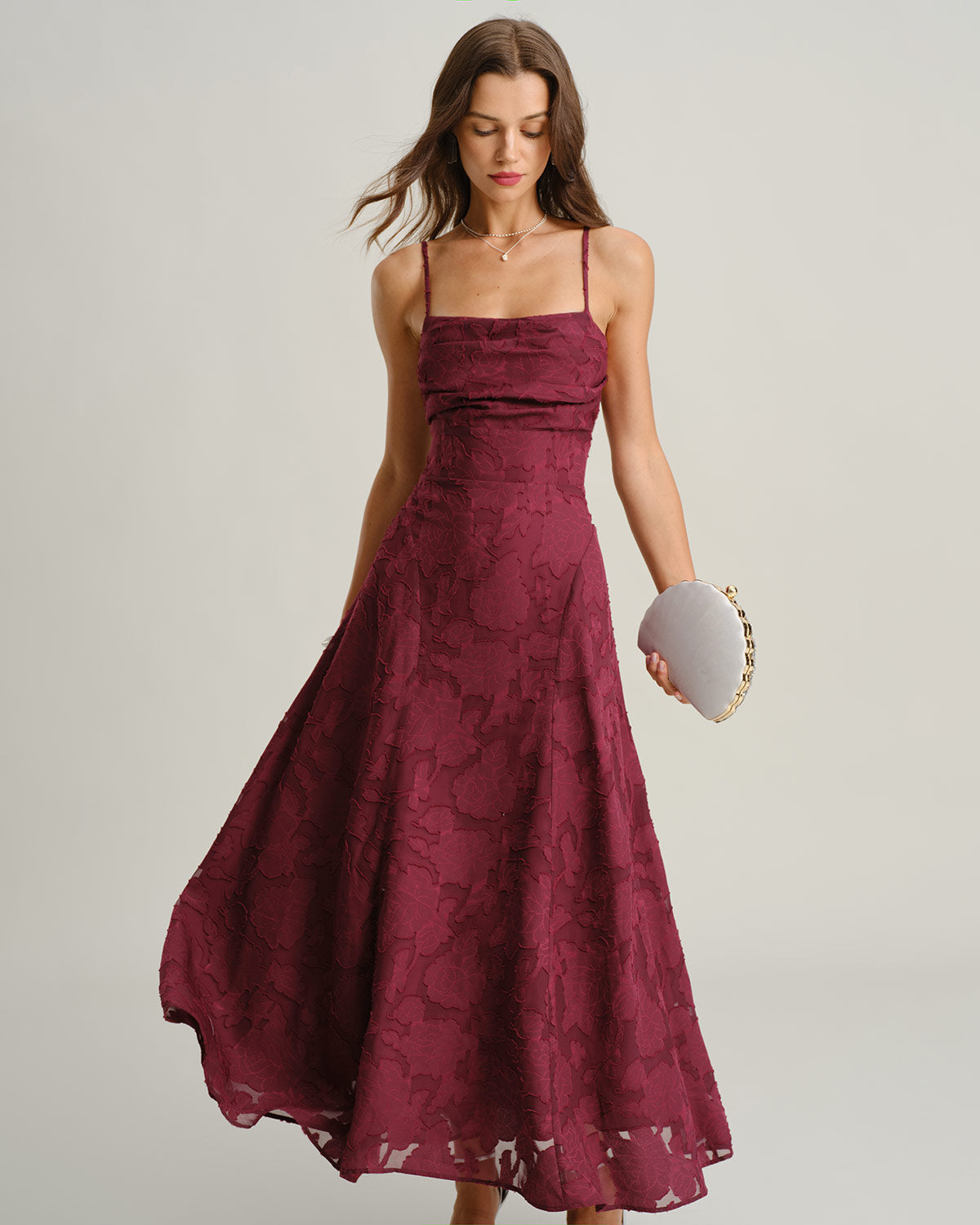 Maxi jurk met spaghettibandjes en elegante slip stijl