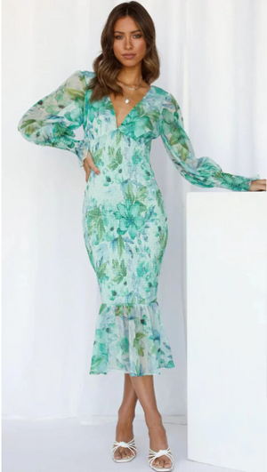 Elegante midi jurk met lange mouwen en bloemenprint