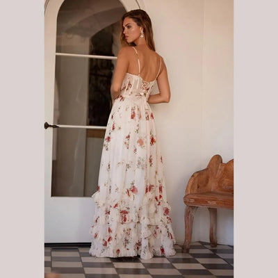 Elegante maxi jurk met subtiel bloemenpatroon en smalle bandjes