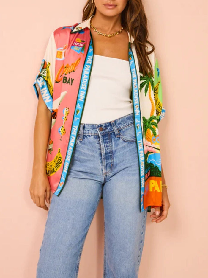 Tweedelige zomerset met wijde blouse en broek met strandprint